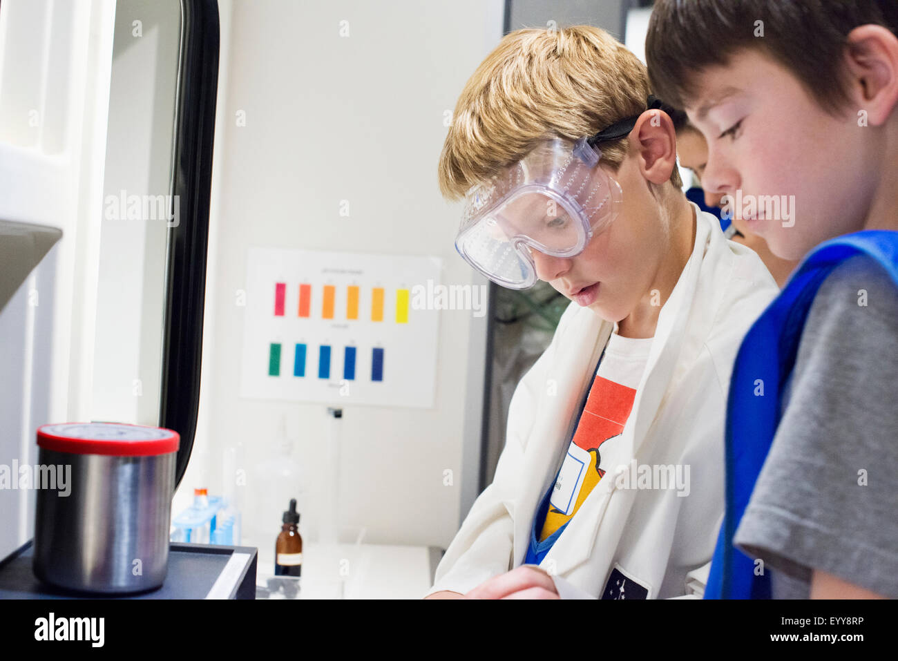 Students working together in science lab Stock Photo