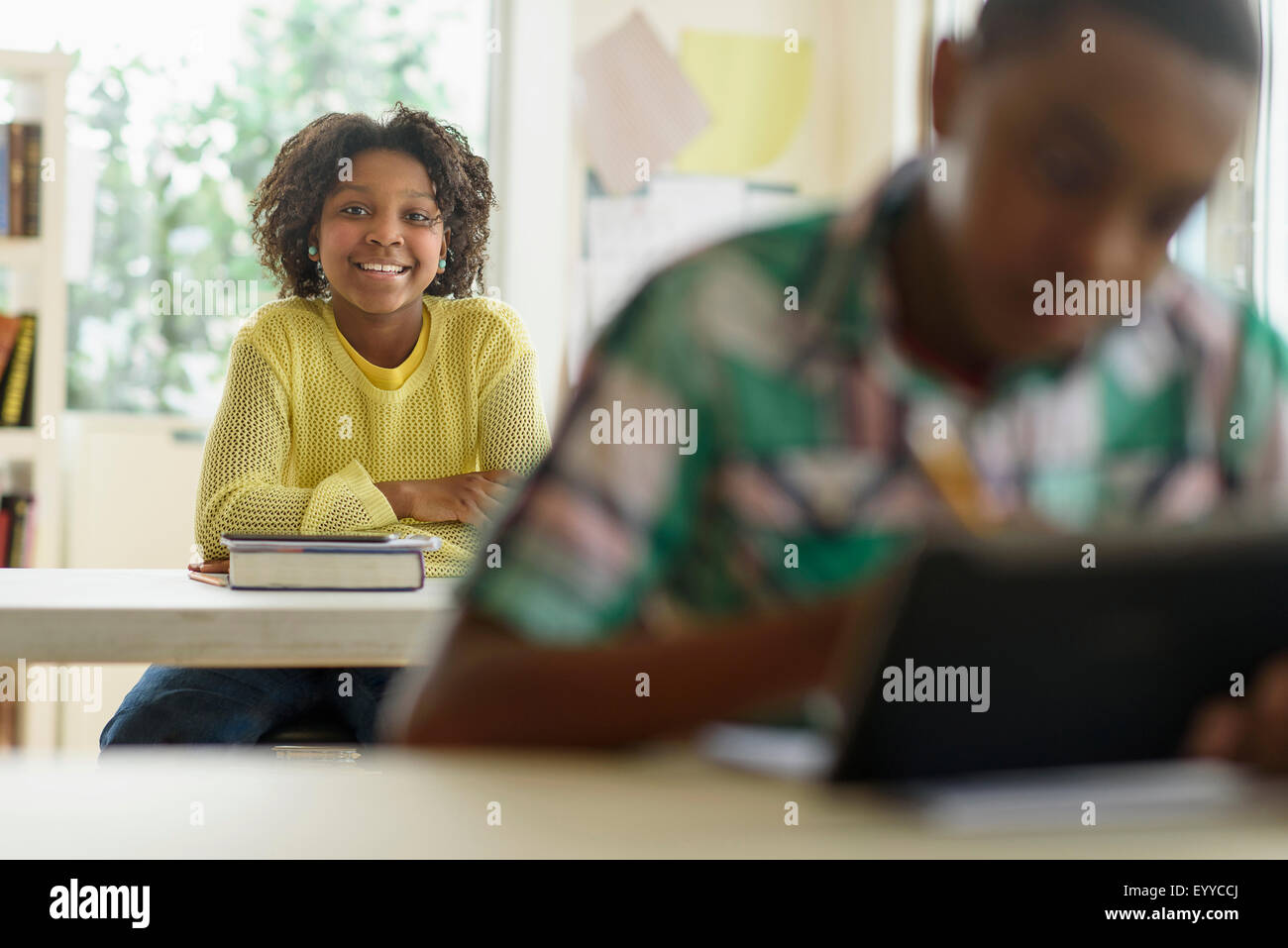 Black student smiling in classroom Stock Photo