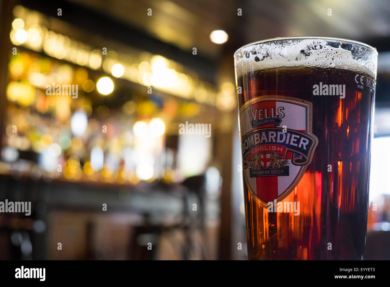 A pint of Bombardier real ale in the Castle Inn, St Ives, Cornwall, England, UK Stock Photo
