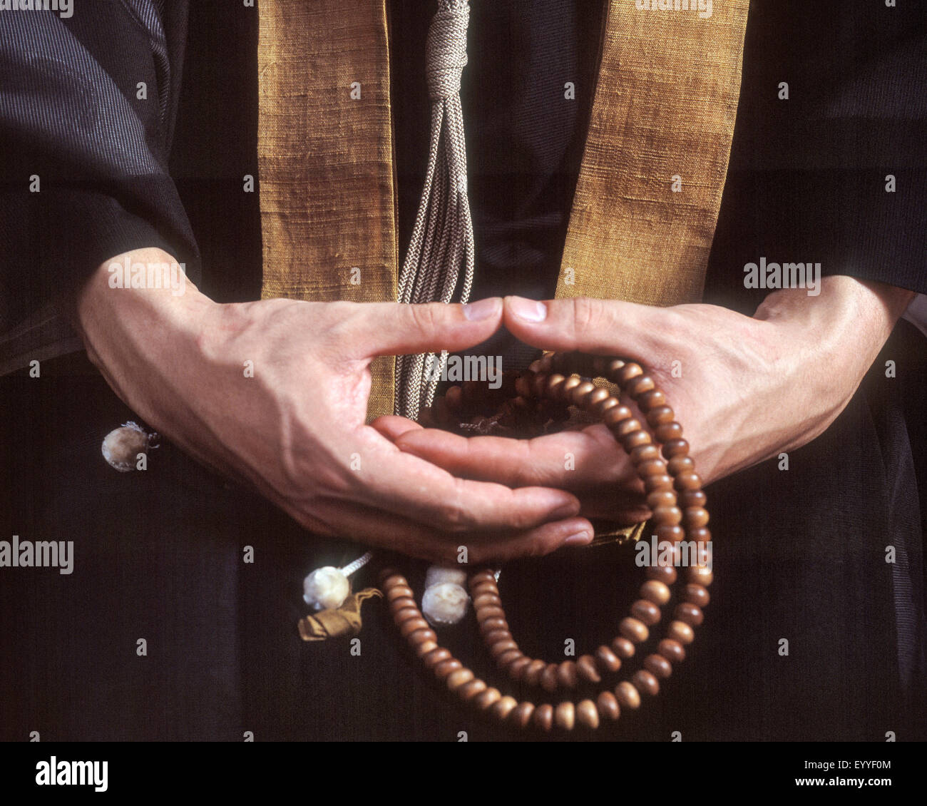 Prayer beads priest hi-res stock photography and images - Alamy