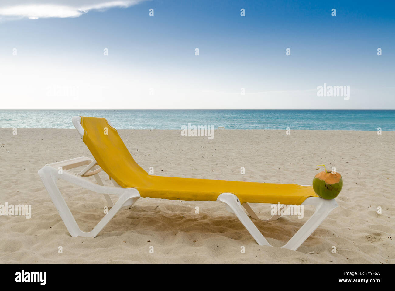 deckchair with coconut, seashore Stock Photo