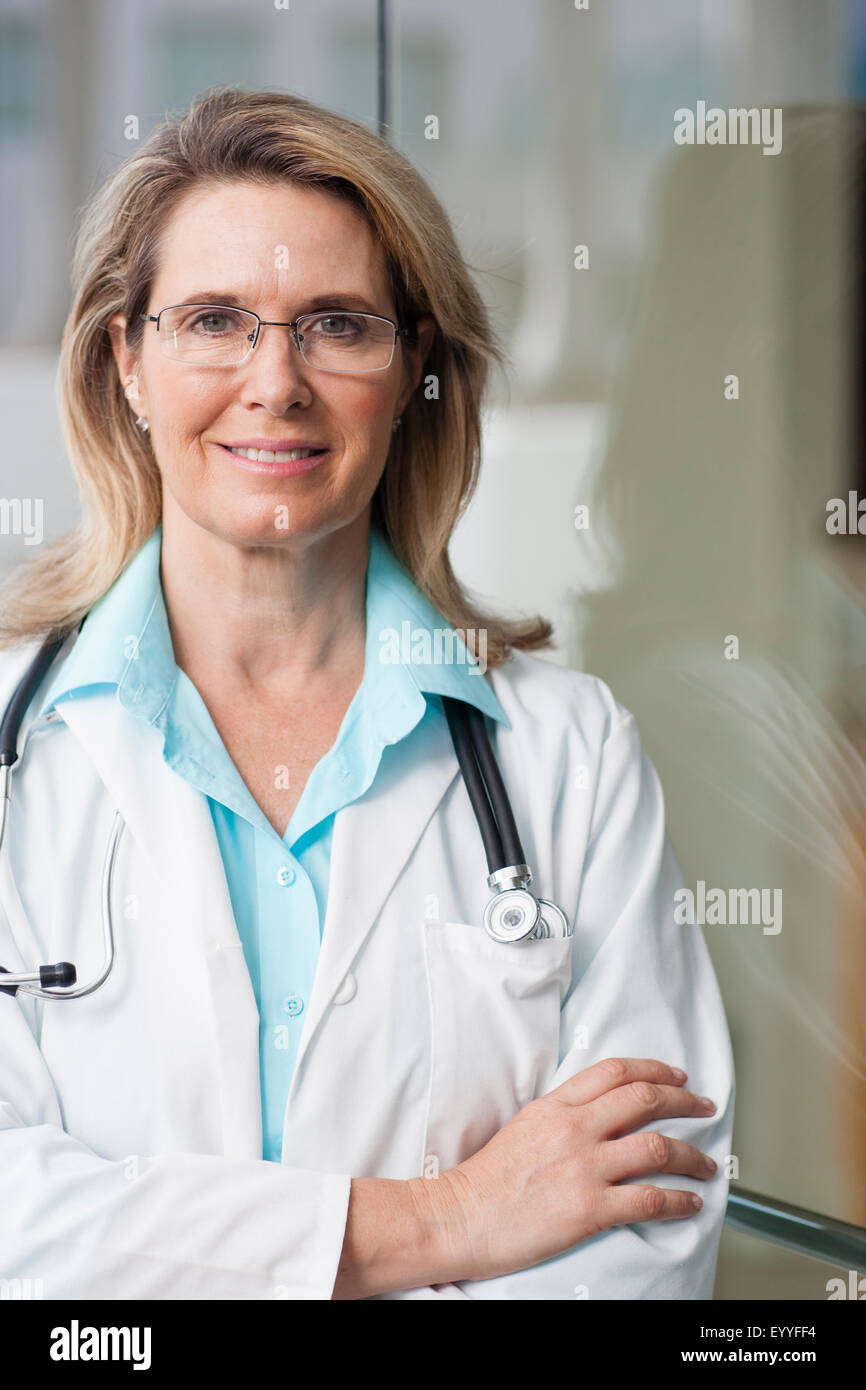 Doctor portrait arms crossed hi-res stock photography and images - Alamy