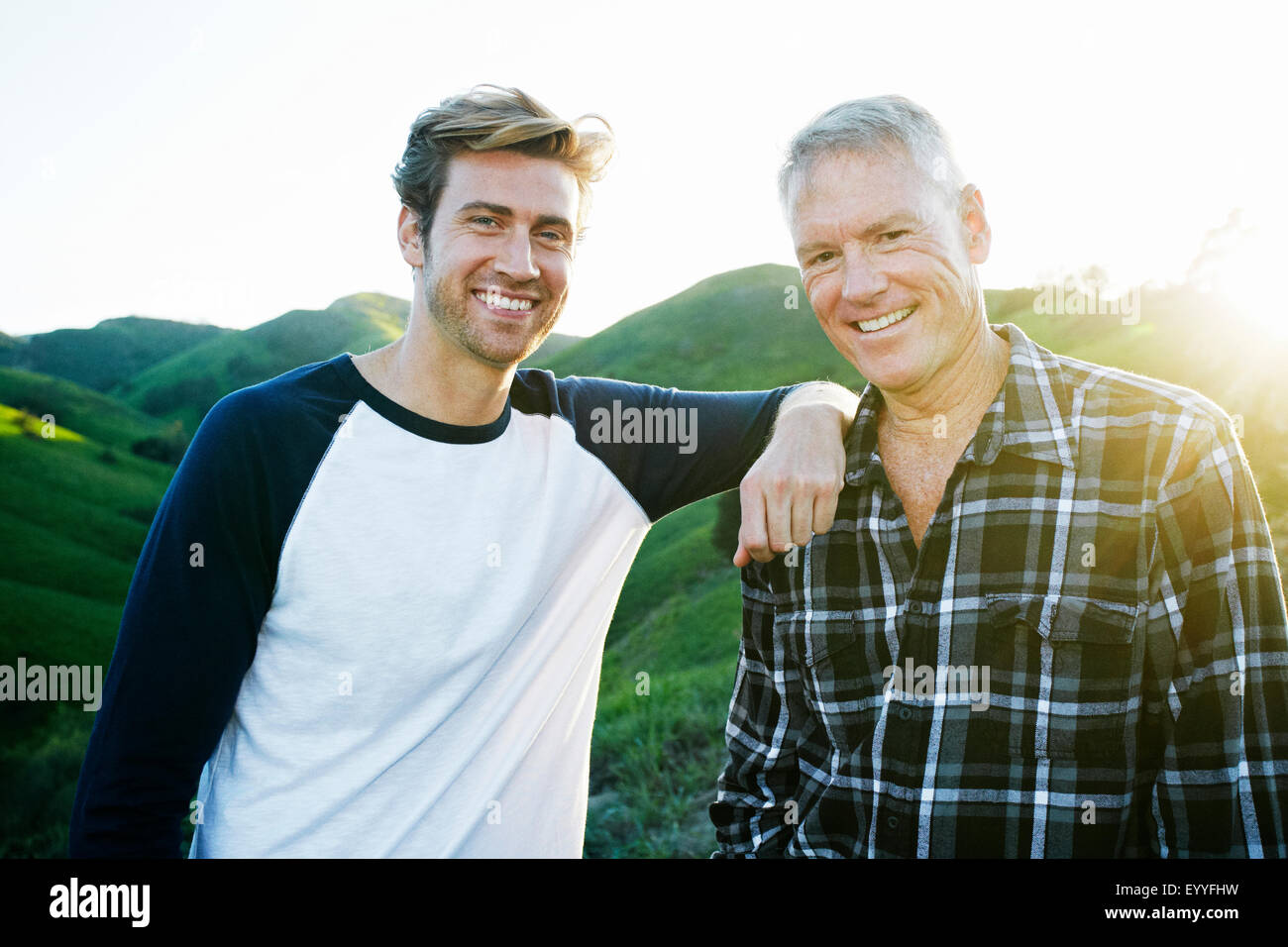 Father adult son smiling camera hi-res stock photography and images - Alamy