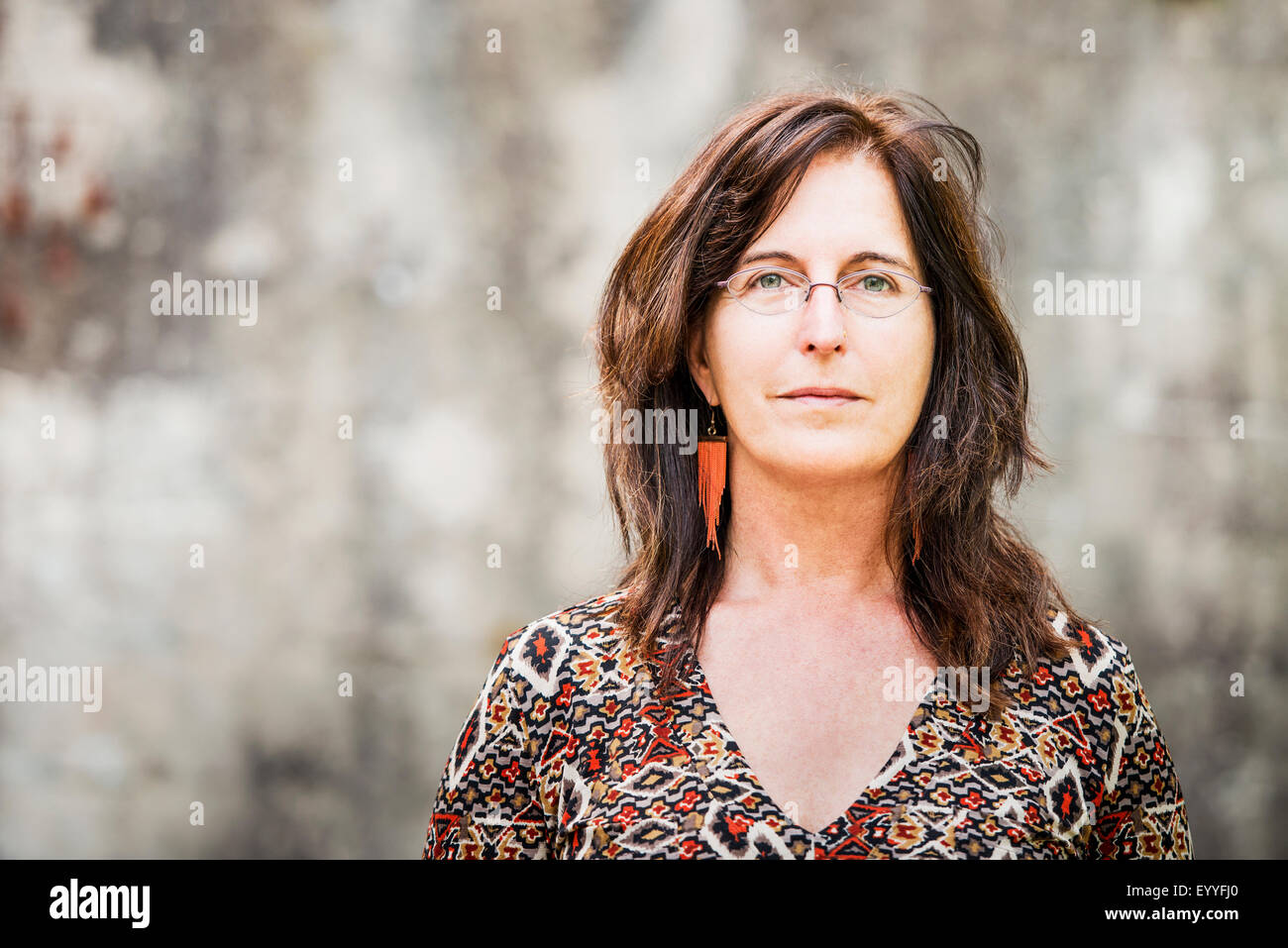 Close up of Caucasian woman with serious expression Stock Photo