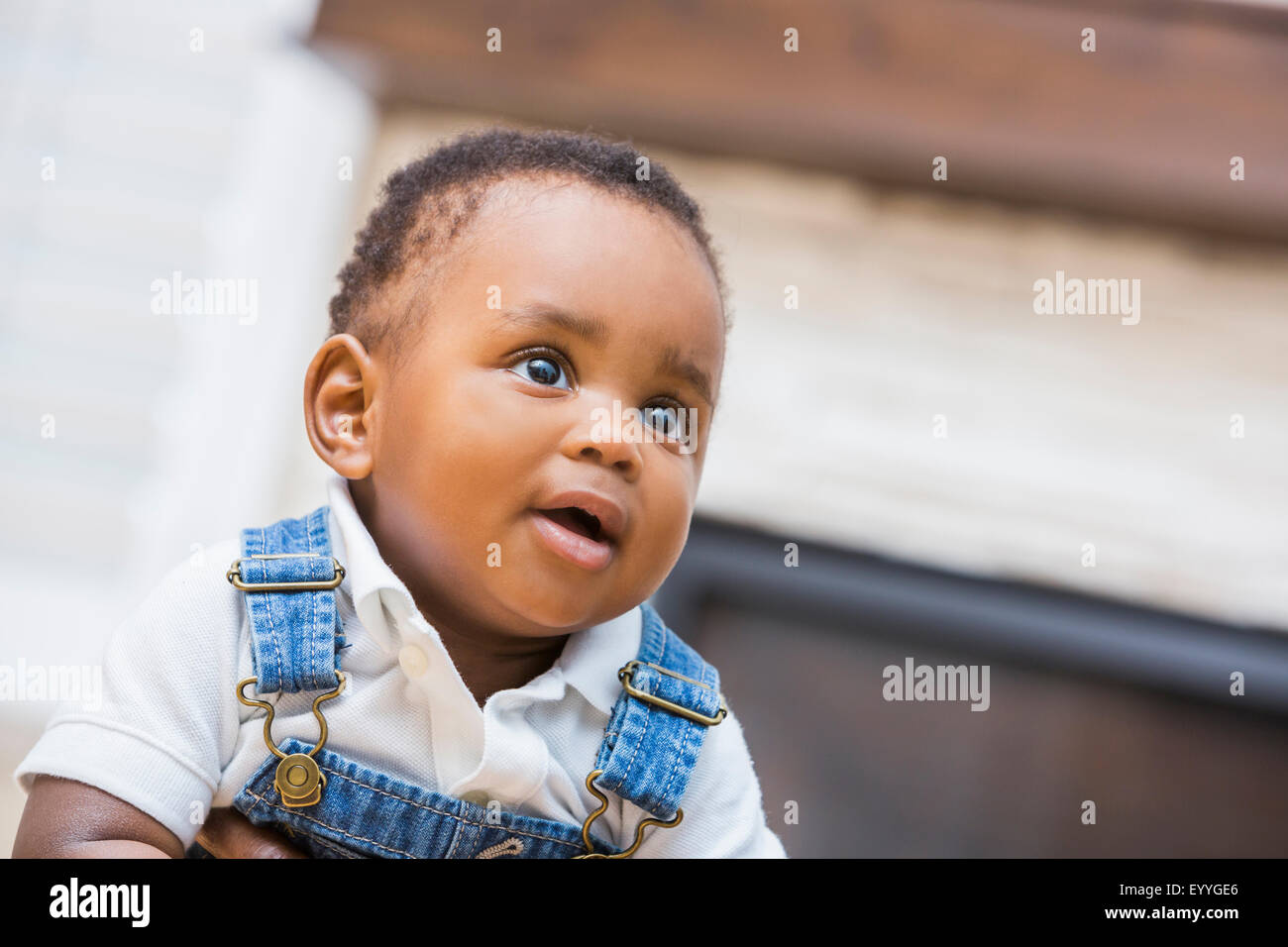 Close up of Black baby boy in living room Stock Photo