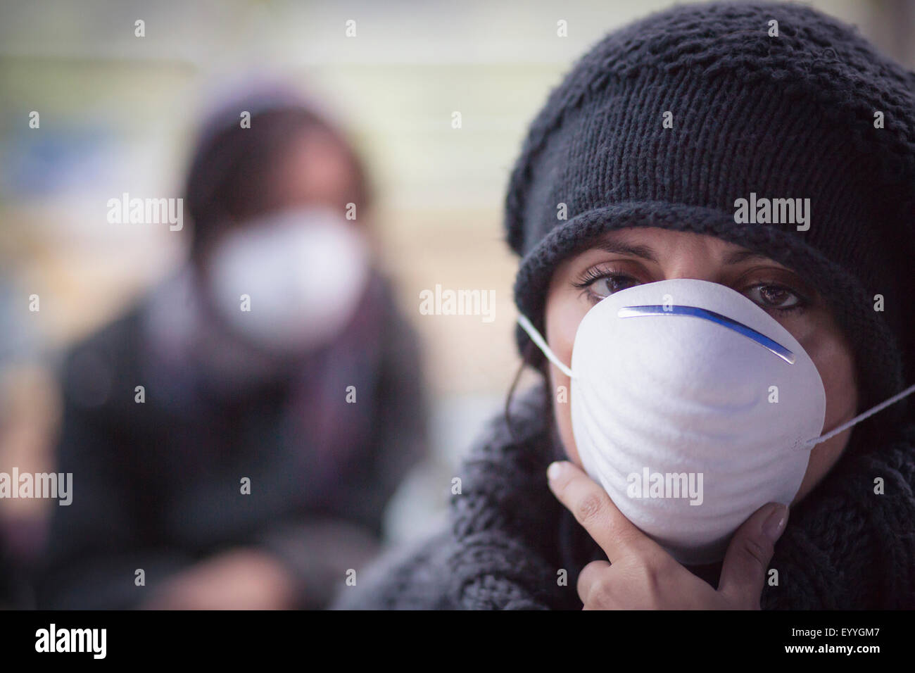 Caucasian woman wearing protective breathing mask Stock Photo