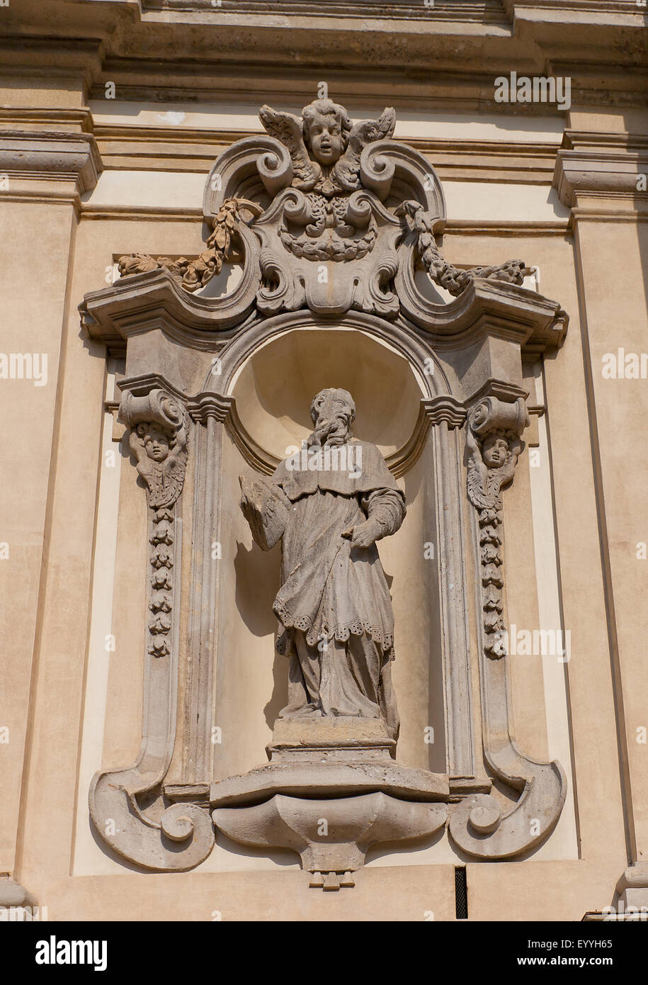 Statue of Charles Borromeo, the archbishop of Milan from 1564 to 1584, on facade of  Church of Santa Maria della Passione in Mil Stock Photo