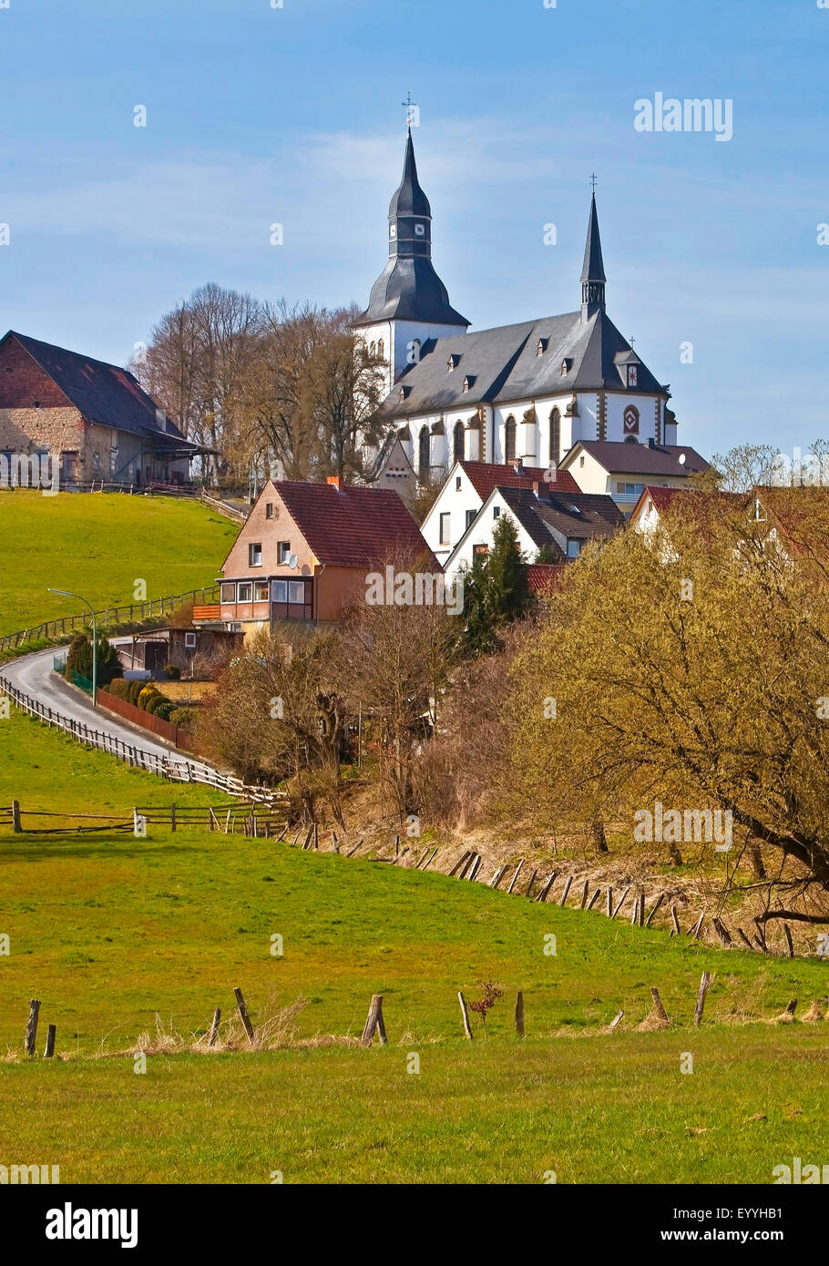 district Altenruethen with parish church St. Gervasius and St. Protasius, Germany, North Rhine-Westphalia, Sauerland, Ruethen Stock Photo