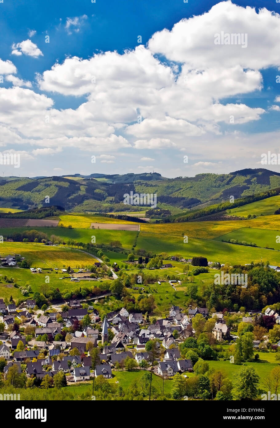 low mountain range and village Bruchhausen in spring, Germany, North Rhine-Westphalia, Sauerland, Olsberg Stock Photo