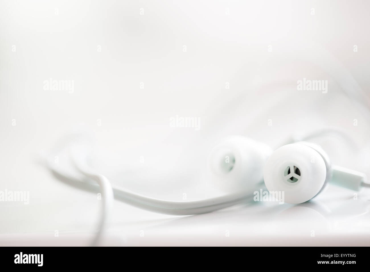 White earphones, close up photo, small dof Stock Photo