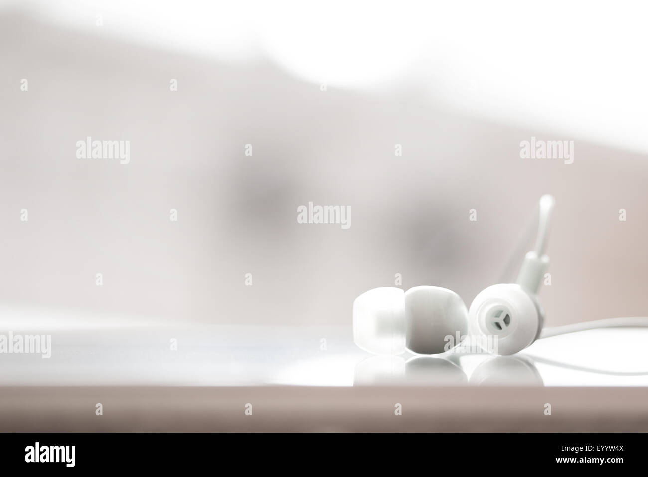 White earphones, close up photo, small dof Stock Photo