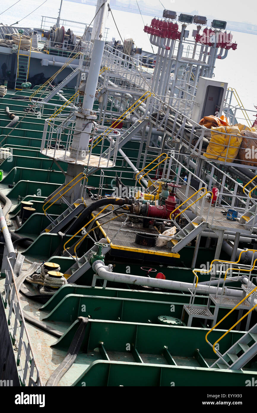 Oil tanker supplying fuel oil (bunkers) to Passenger cruise ship. Port of Dubai .UAE Stock Photo