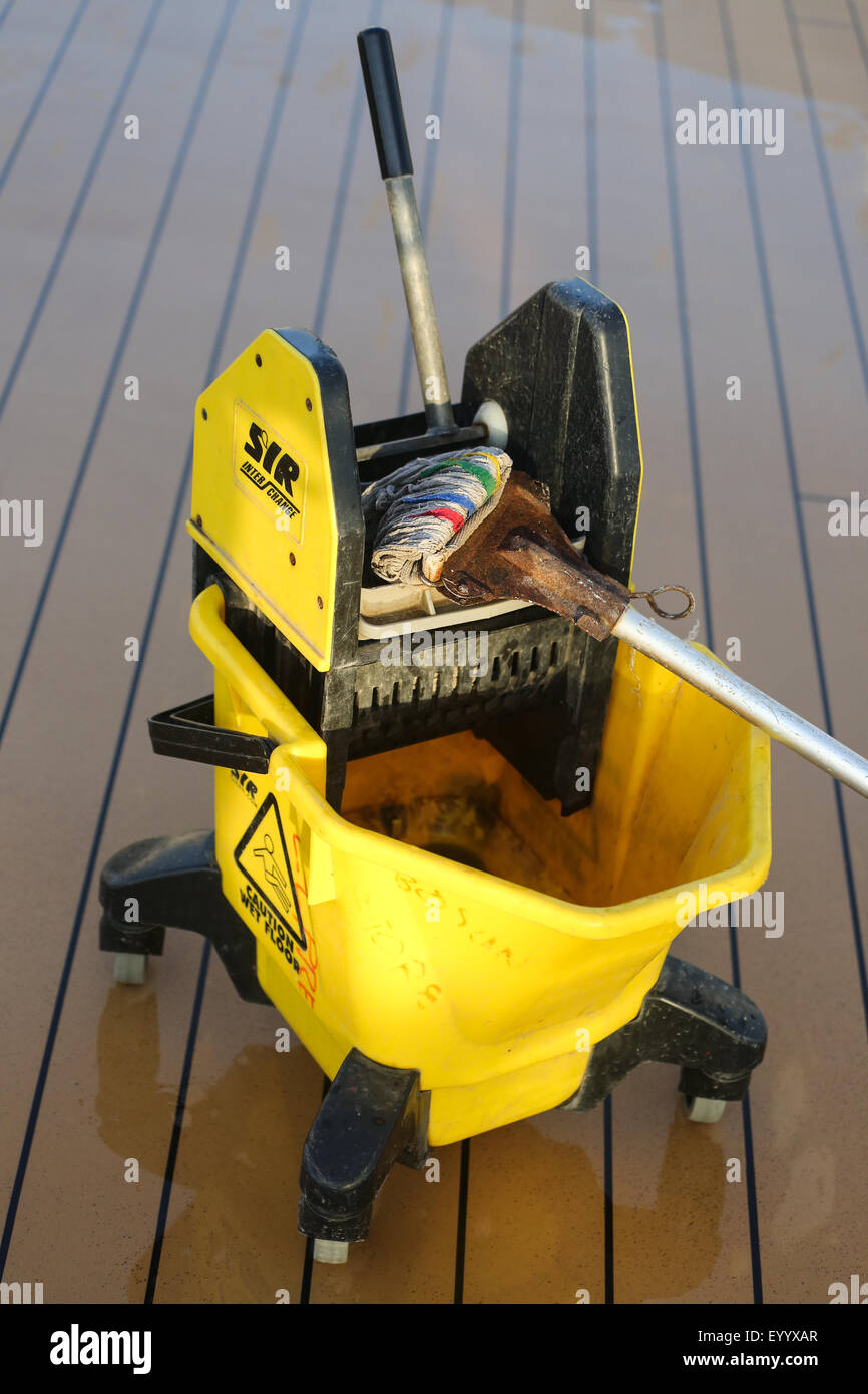 mop and bucket. Passenger decks Cunard Liner Queen Elizabeth Stock