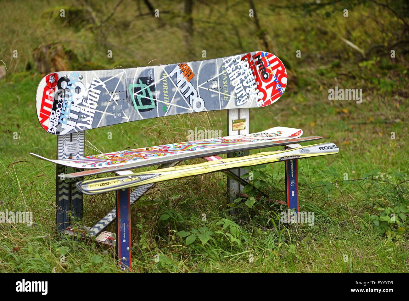 a little bench made of skiers and snowboards, Germany, Bavaria Stock Photo