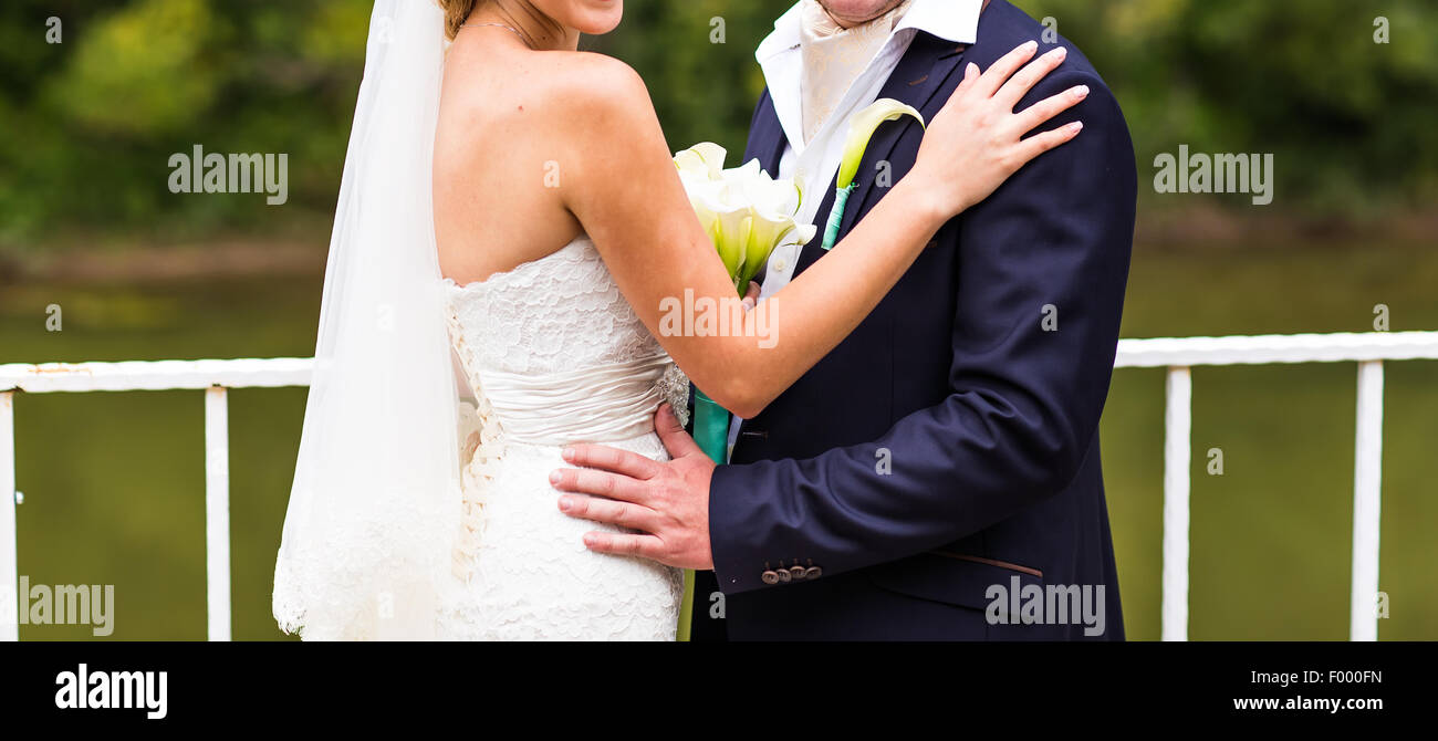 Wedding couple in park Stock Photo - Alamy