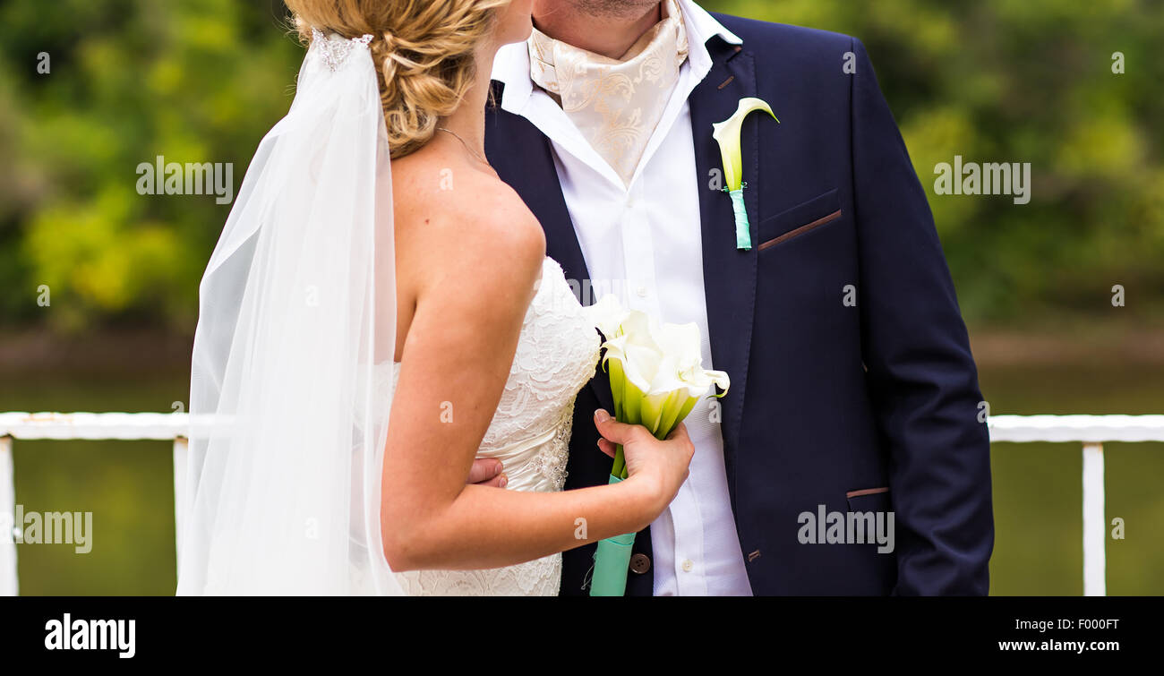 Wedding couple in park Stock Photo - Alamy