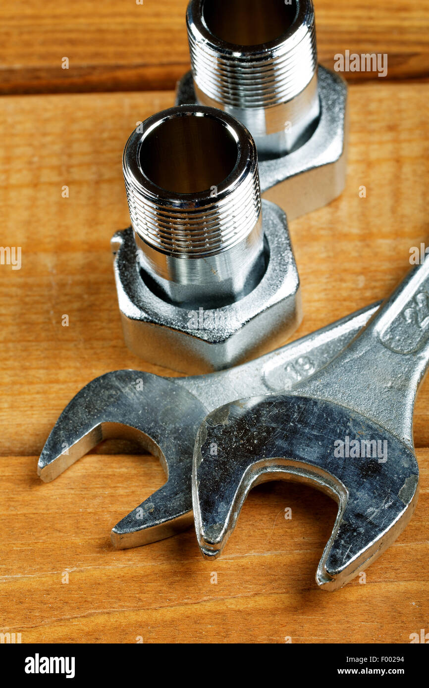 Wrenches with bolts on a desktop Closeup Stock Photo Alamy