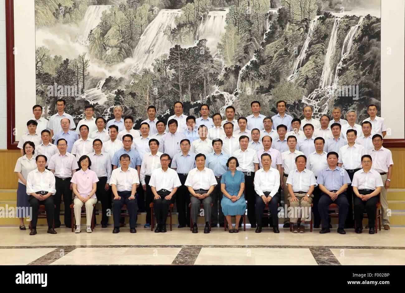 Beidaihe, China's Hebei Province. 5th Aug, 2015. Liu Yunshan (front row, 5th, L), a member of the Standing Committee of the Political Bureau of the Communist Party of China Central Committee, poses for a group photo with scientists and experts who are enjoying a state-sponsored summer vacation at Beidaihe, a popular seaside resort in north China's Hebei Province, Aug. 5, 2015. Credit:  Liu Weibing/Xinhua/Alamy Live News Stock Photo