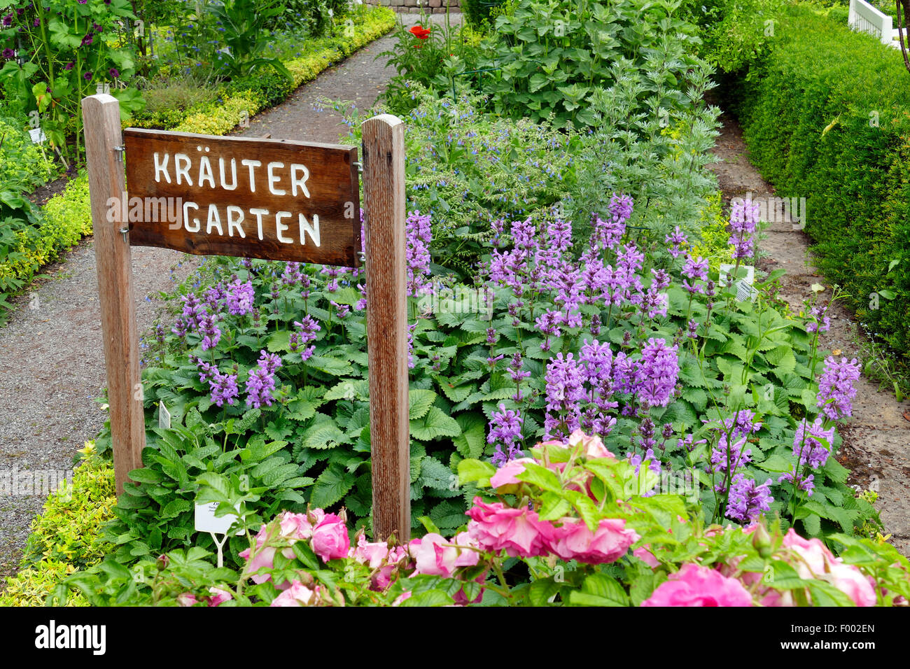 herb garden with sign Kraeutergarten, Germany Stock Photo