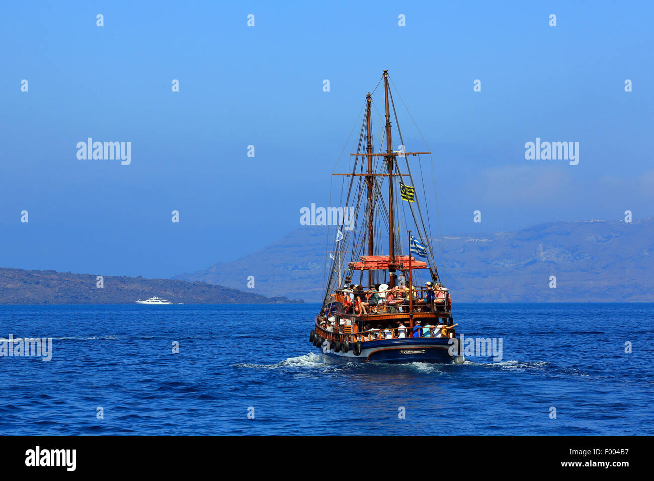 excursion boat to volcanic Island Nea Kameni, Greece, Cyclades, Santorin Stock Photo