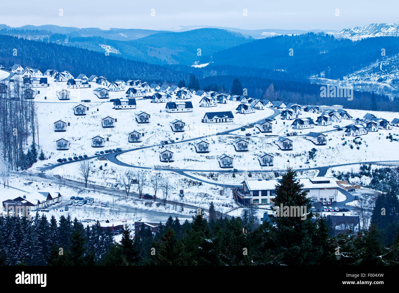 holiday settlement in snow, Germany, North Rhine-Westphalia, Sauerland, Winterberg Stock Photo