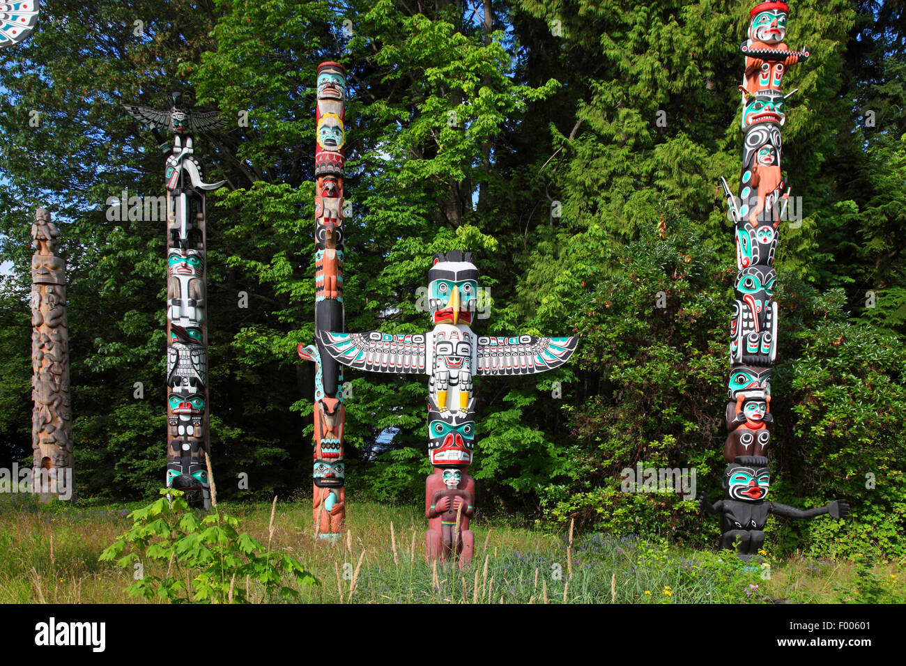 totem poles in the Stanley Park, Canada, British Columbia, Vancouver Stock Photo