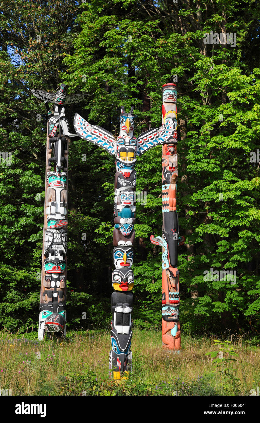 totem poles in the Stanley Park, Canada, British Columbia, Vancouver Stock Photo
