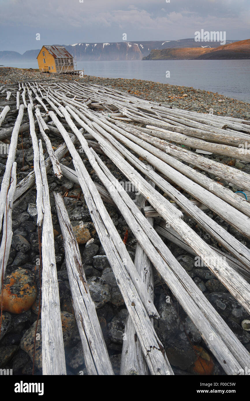collapsed wooden construction for drying fish, Norway Stock Photo