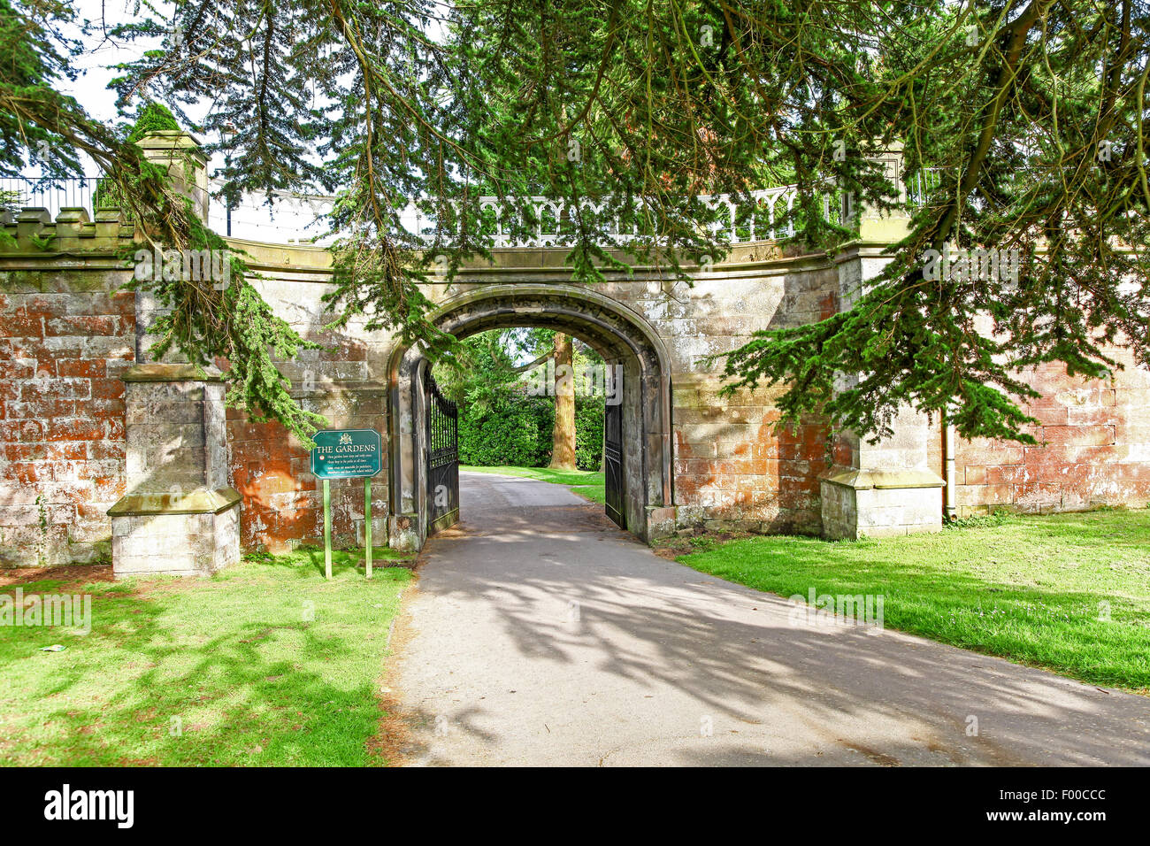 An old ornate bridge leading into the gardens at Alton Towers Estate