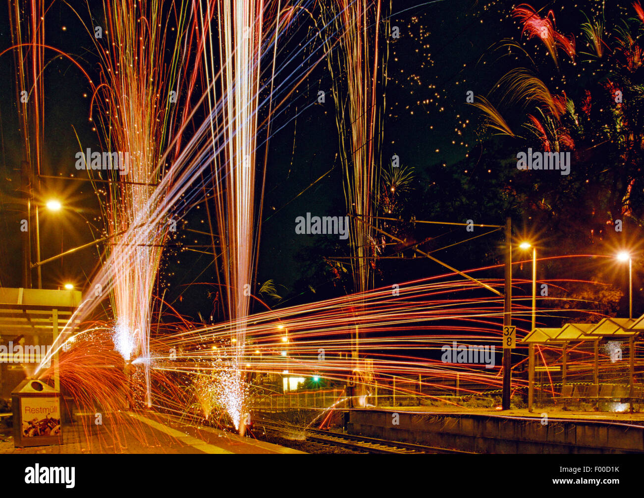illegal fireworks at railway station, Germany Stock Photo
