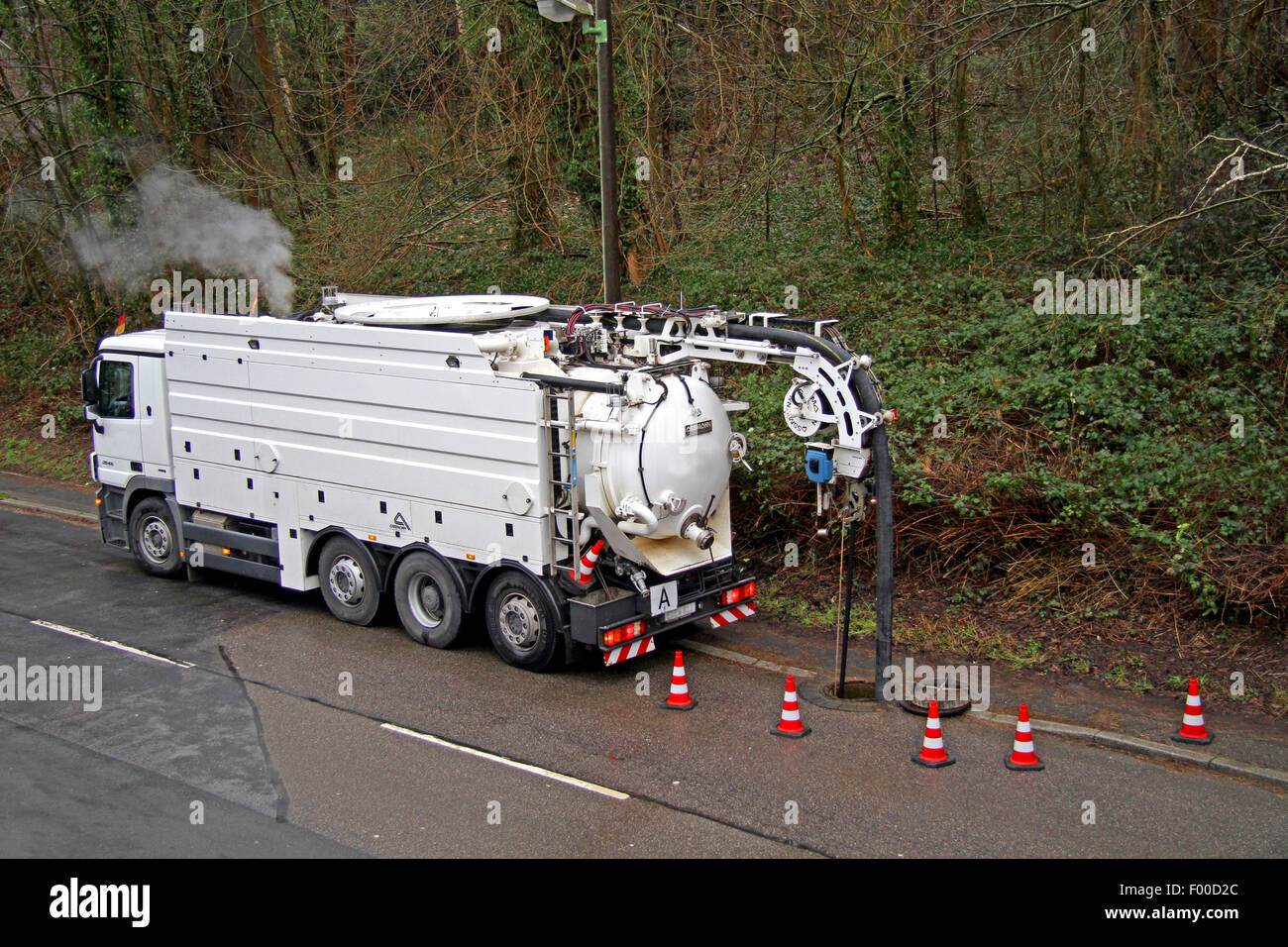 vacuum truck cleaning the canalisation, Germany Stock Photo