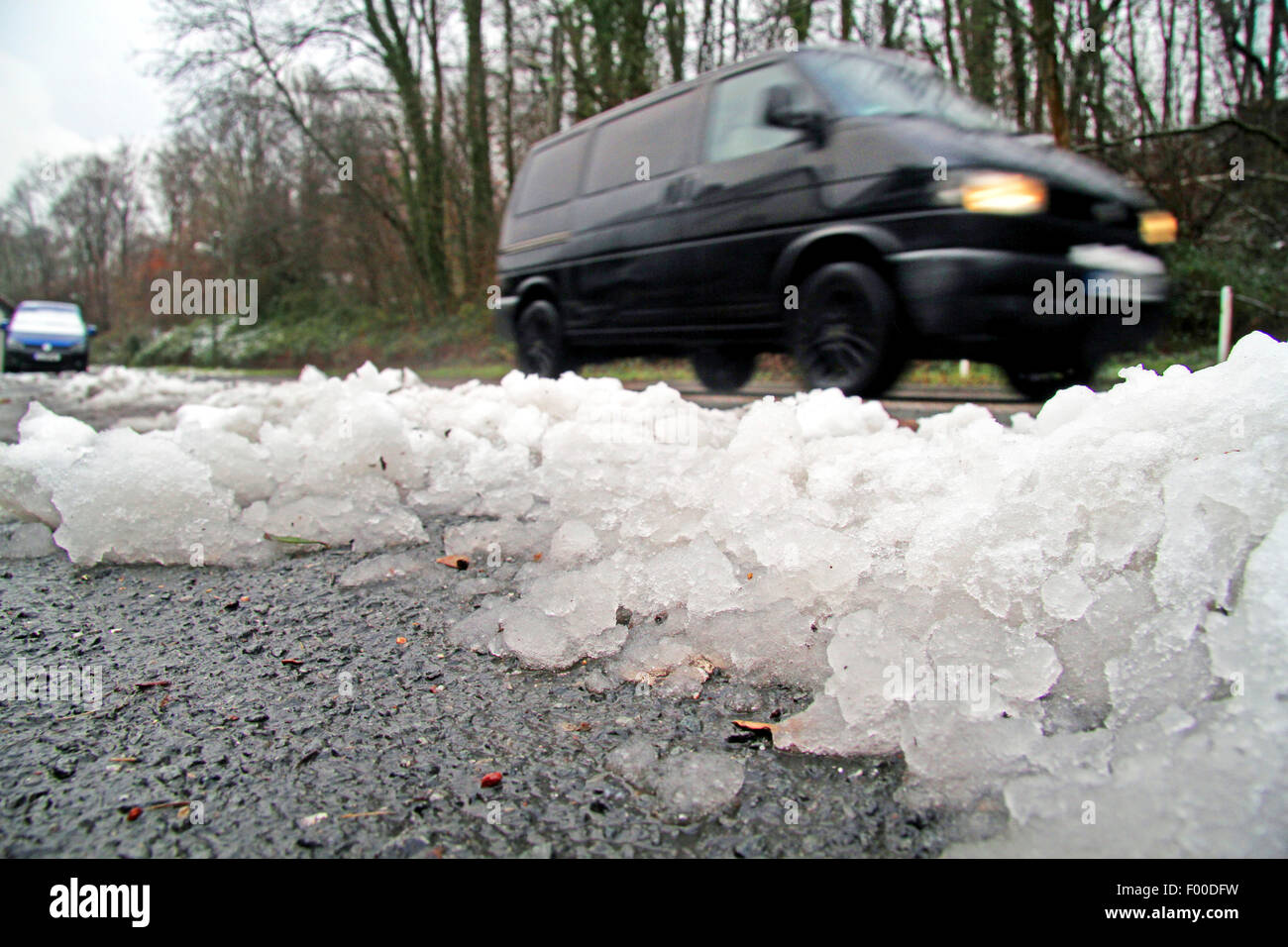 snow slushes roadsides, Germany Stock Photo