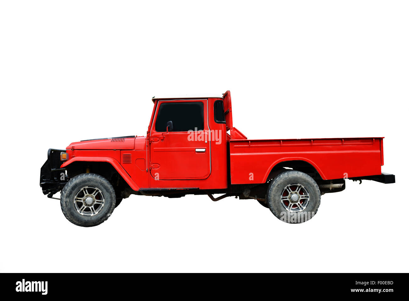 Old candy red pick up truck isolated on a white background Stock Photo