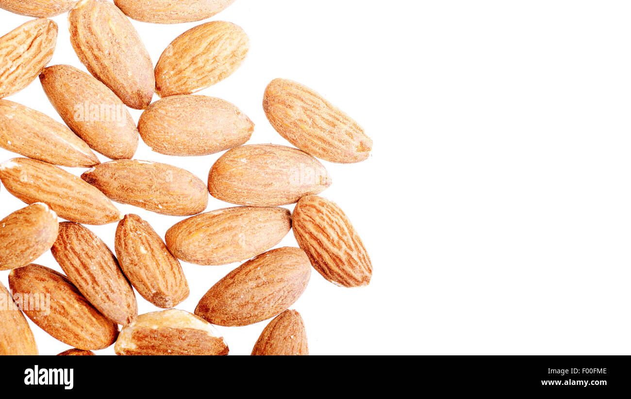 group of almonds isolated on white Stock Photo - Alamy