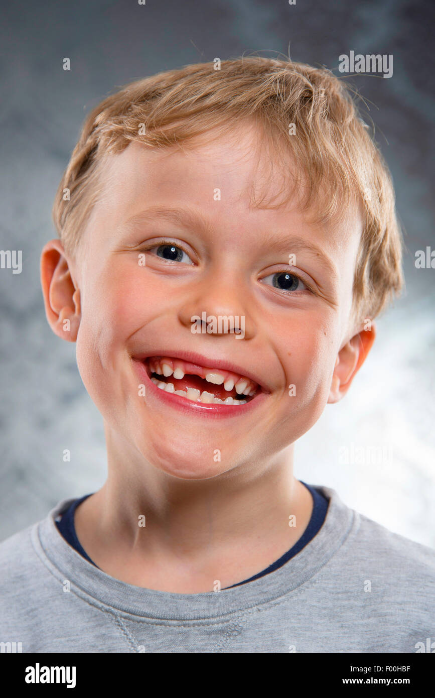 smiling six year old boy with tooth gap Stock Photo