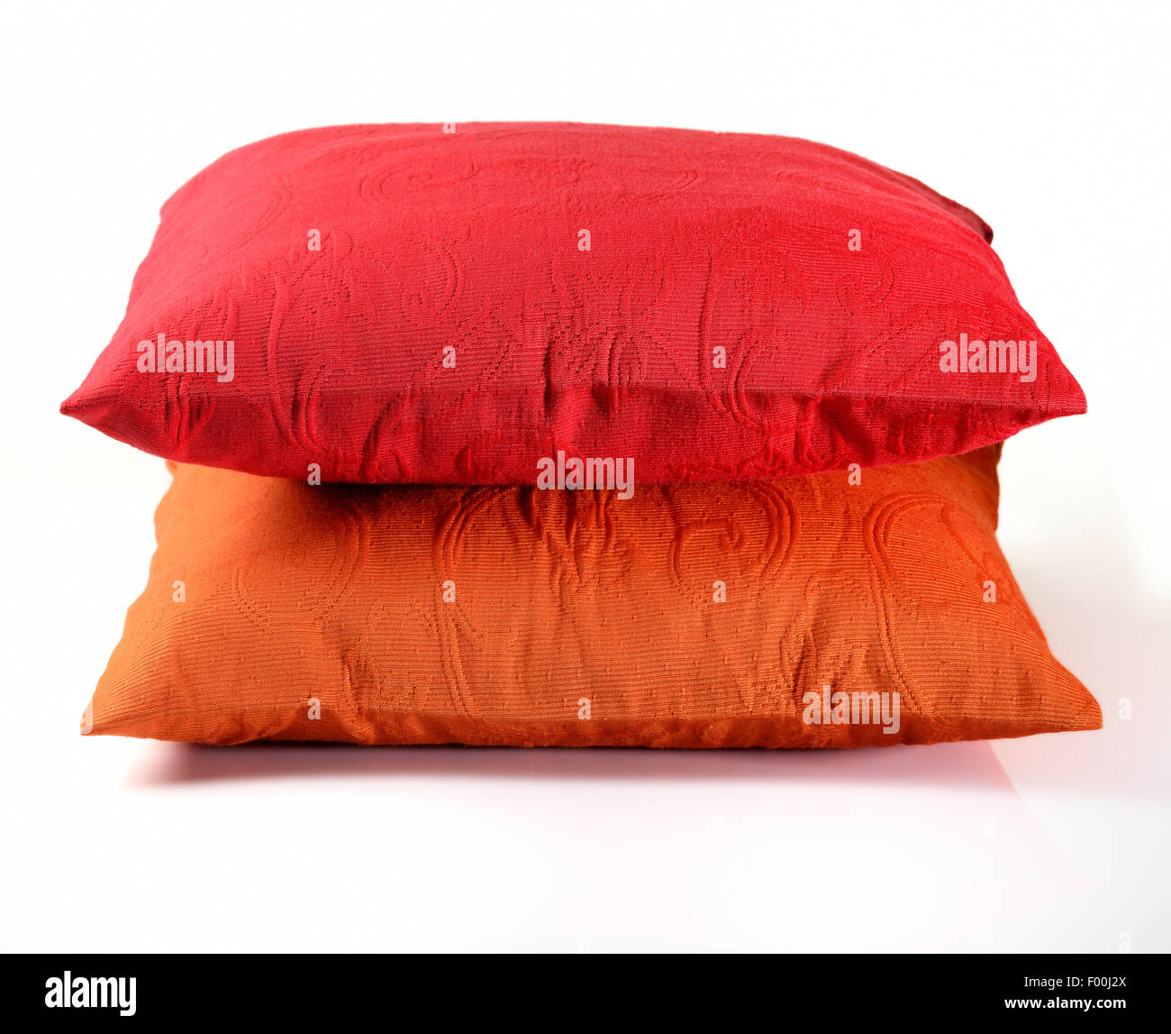 Red and Orange Pillow on white background Stock Photo