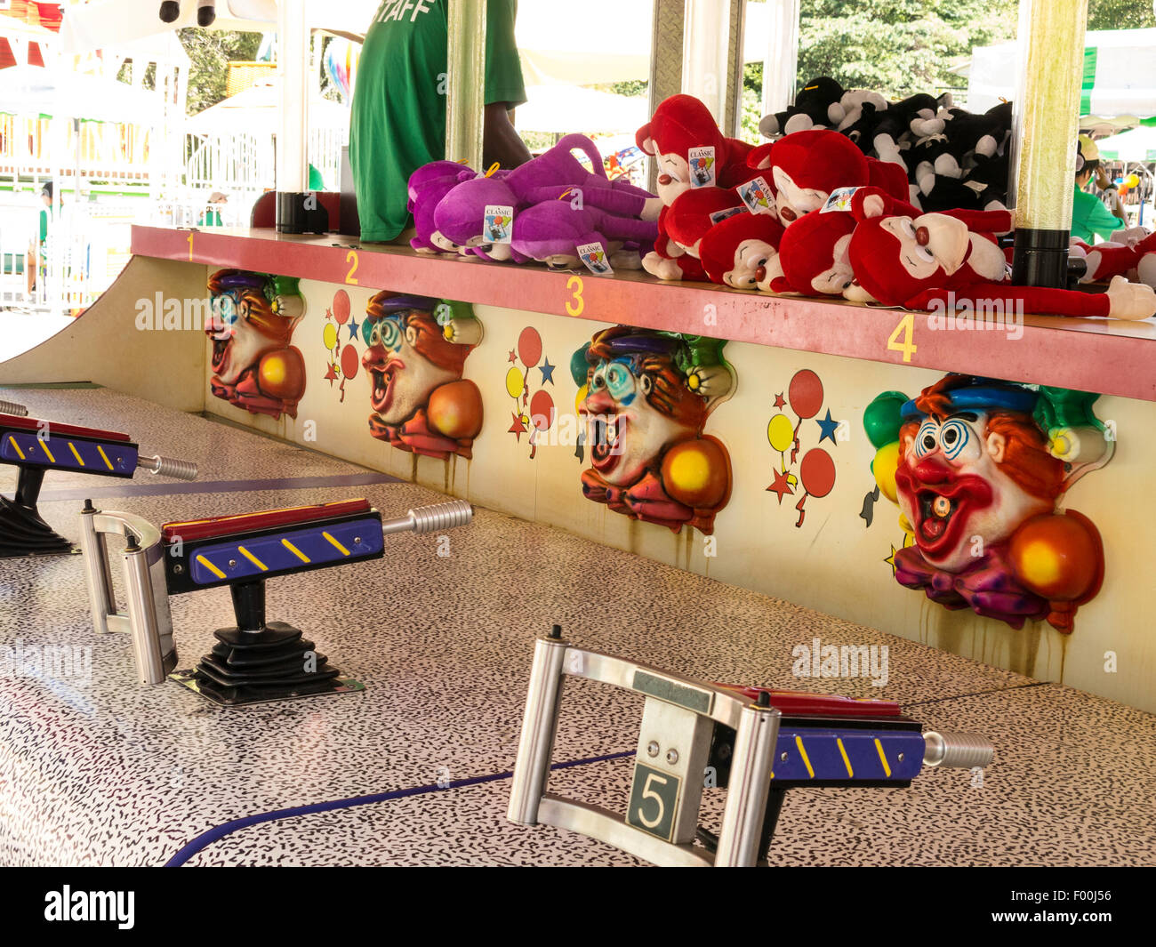 Arcade Sharpshooter Game with Clown Theme in Central Park, NYC Stock Photo