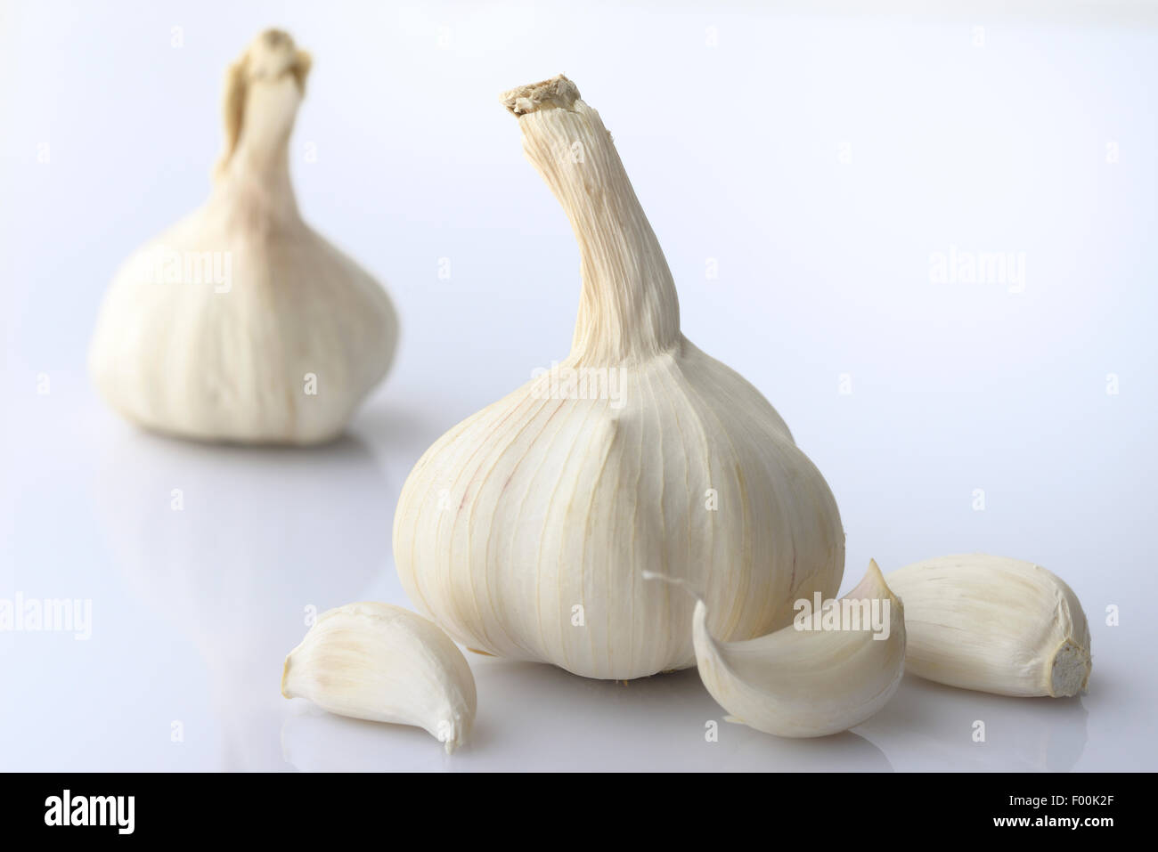 Garlic Bulb And Cloves on White background shot in studio Stock Photo ...