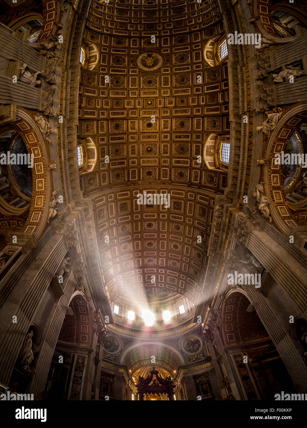 Shafts of light in St Peter's Basilica. Vatican City, Rome. Italy. Stock Photo