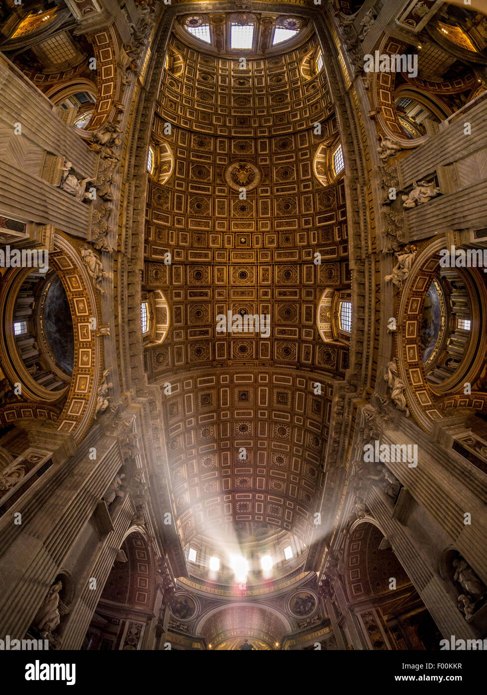 Shafts of light in St Peter's Basilica. Vatican City, Rome. Italy. Stock Photo