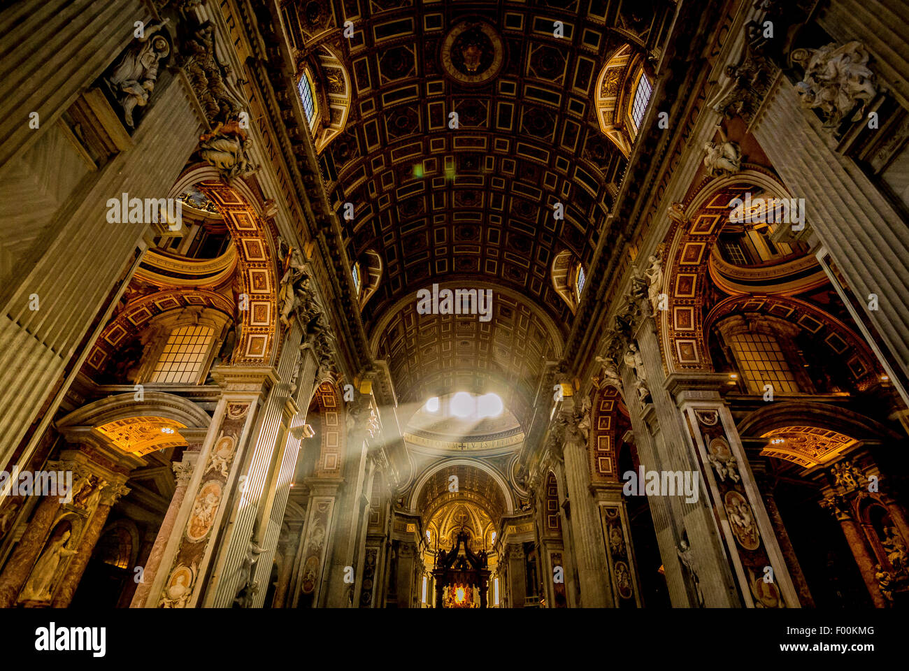 Shafts of light in St Peter's Basilica. Vatican City, Rome. Italy. Stock Photo