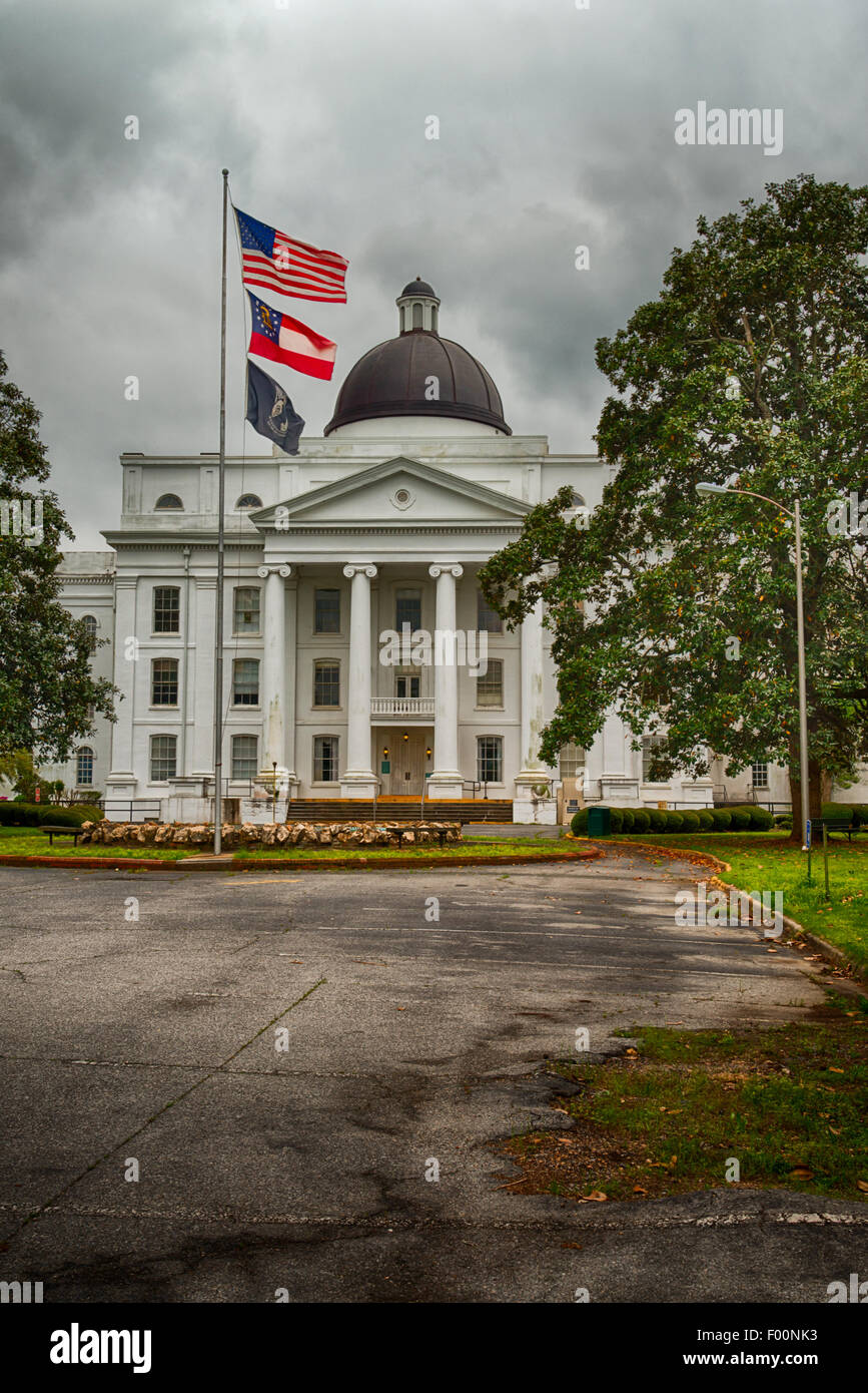 Flags flying at the Powell Building, part of Central State Hospital, Milledgeville, Georgia, USA Stock Photo