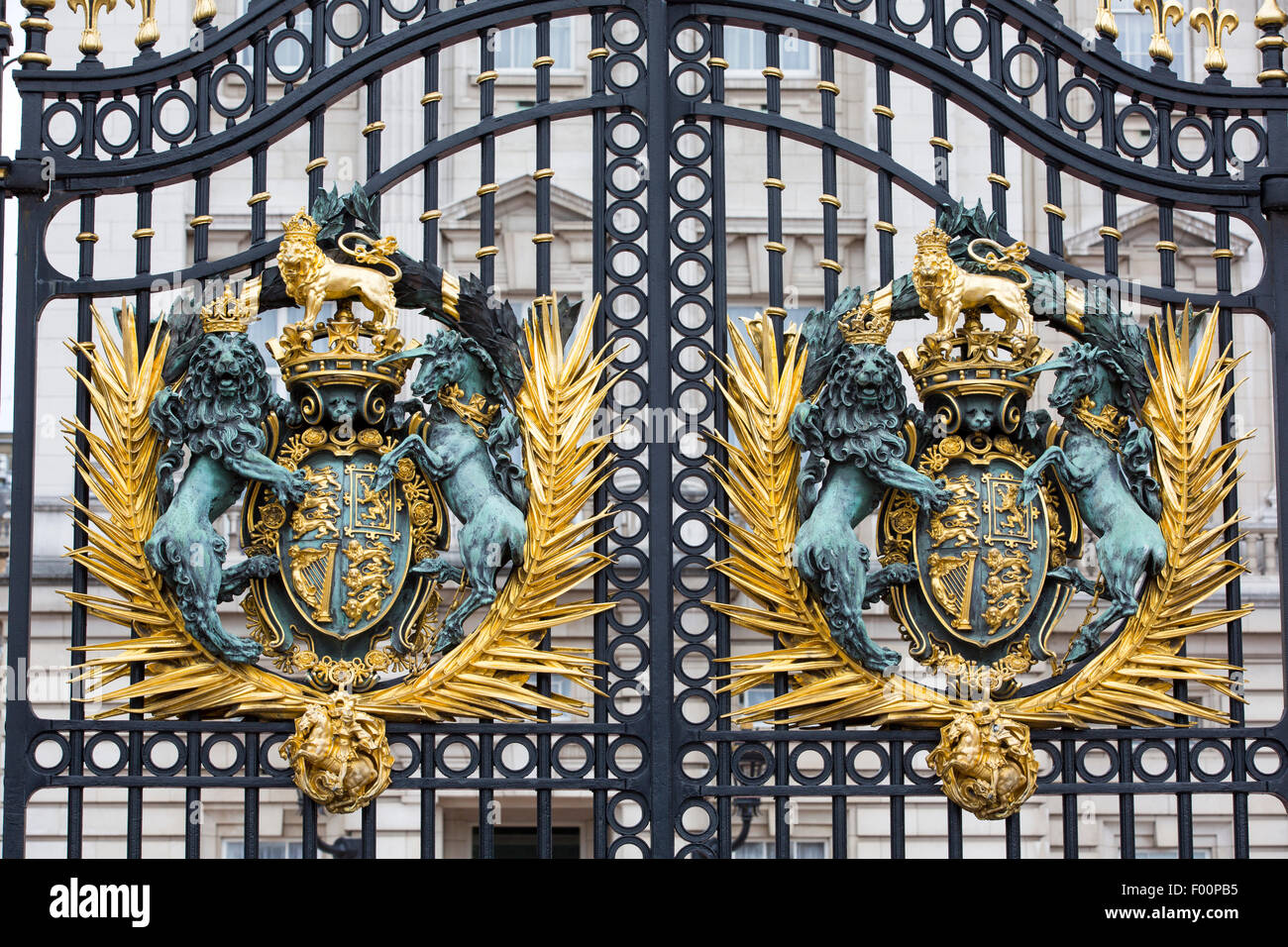 A gold leaf crest on the gates of Buckingham Palace, london, UK. Stock Photo