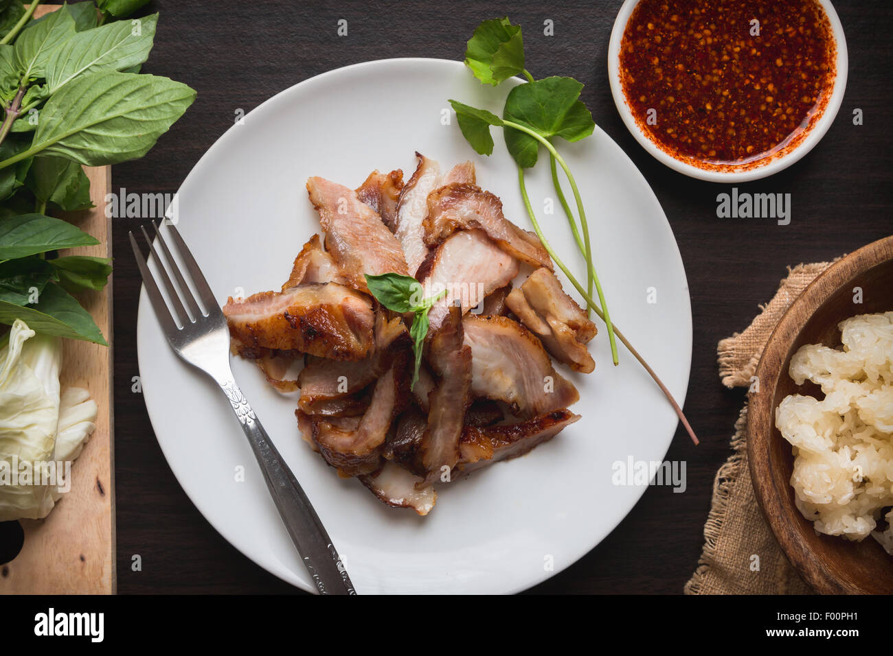 grill pork neck with vegetable, Spicy Dipping Sauce and sticky rice Stock Photo