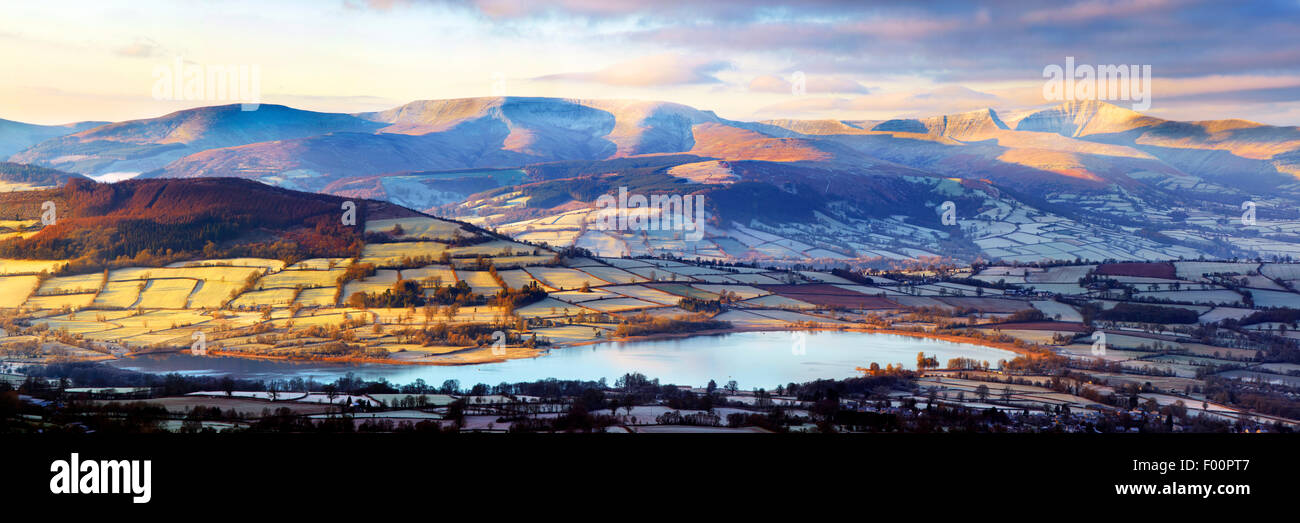 Panoramic view of Llangorse lake and the Brecon Beacons in winter. Stock Photo