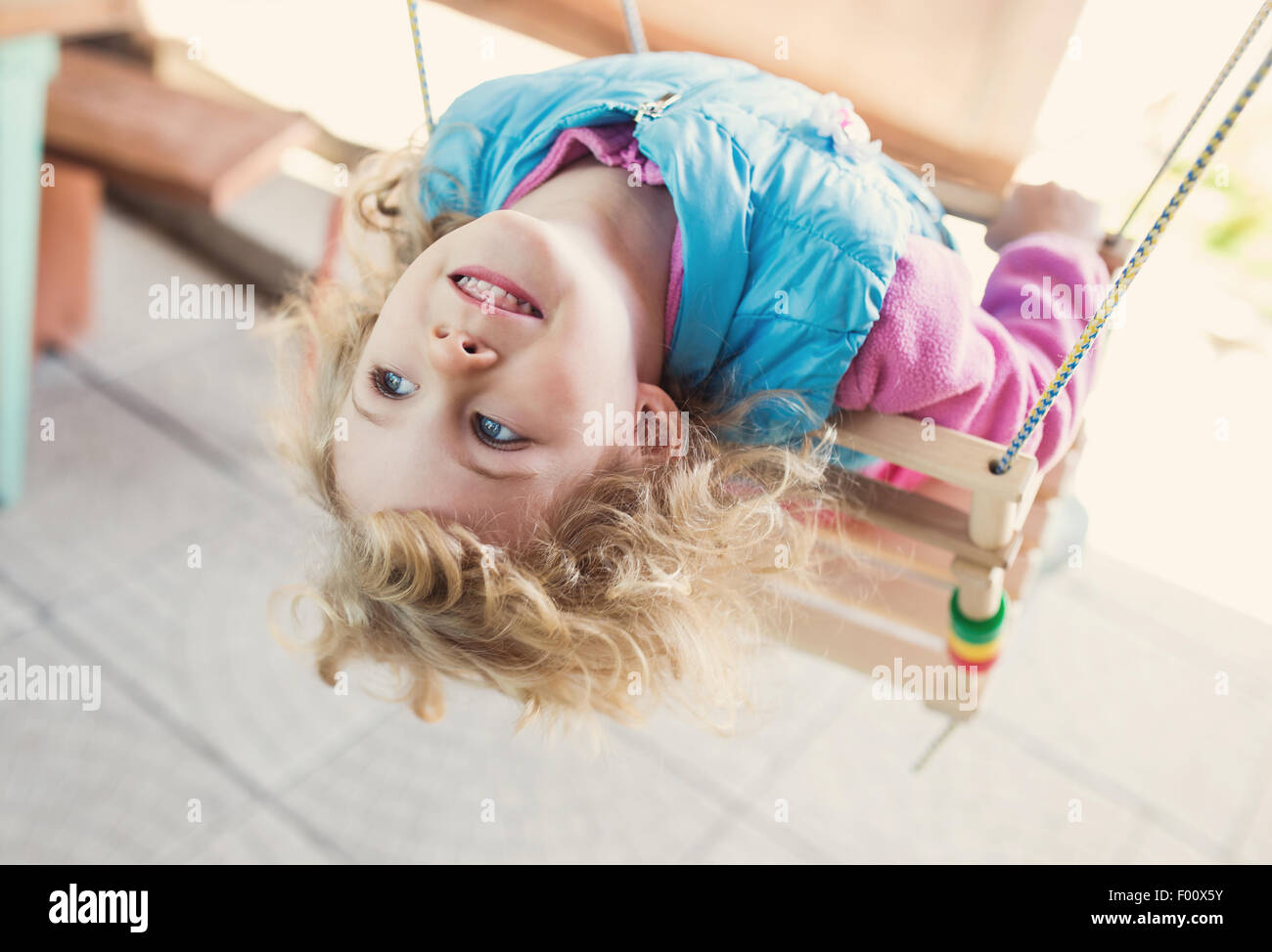 Portrait of cute blonde little girl playing outdoors Stock Photo - Alamy