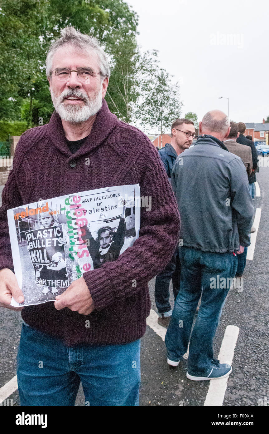 Belfast, Northern Ireland. 5th Aug, 2015. Gerry Adams, Sinn Fein president, takes part in a 'White Line Protest' against the use of plastic bullets in Palestine by the Israeli security forces.  [Note to editors: A white line protest is when many people stand in the middle of the road with posters for a political cause, and have been used by republicans since the start of the troubles. Credit:  Stephen Barnes/Alamy Live News Stock Photo