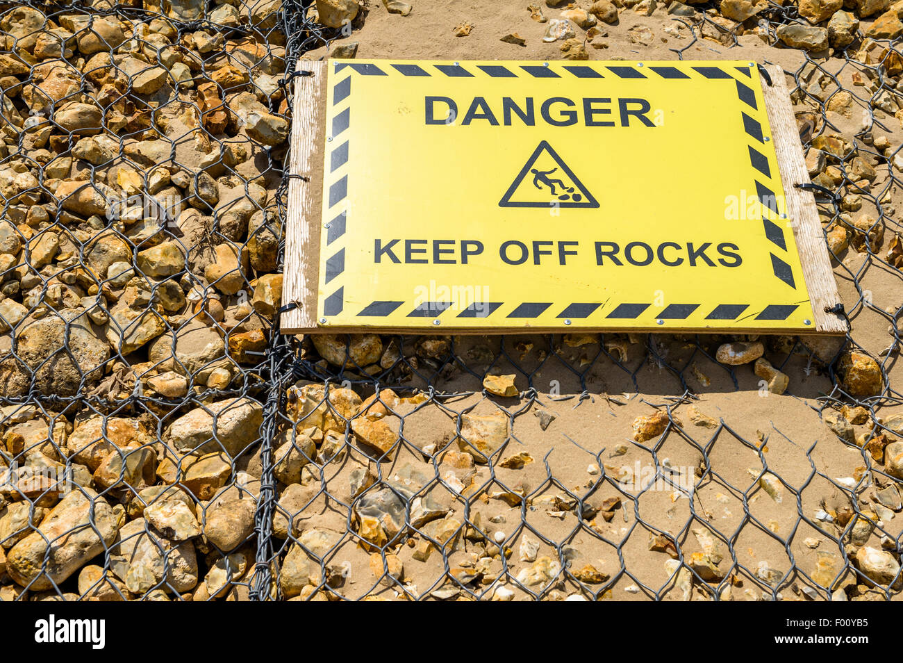 Danger keep off rocks warning sign Stock Photo Alamy