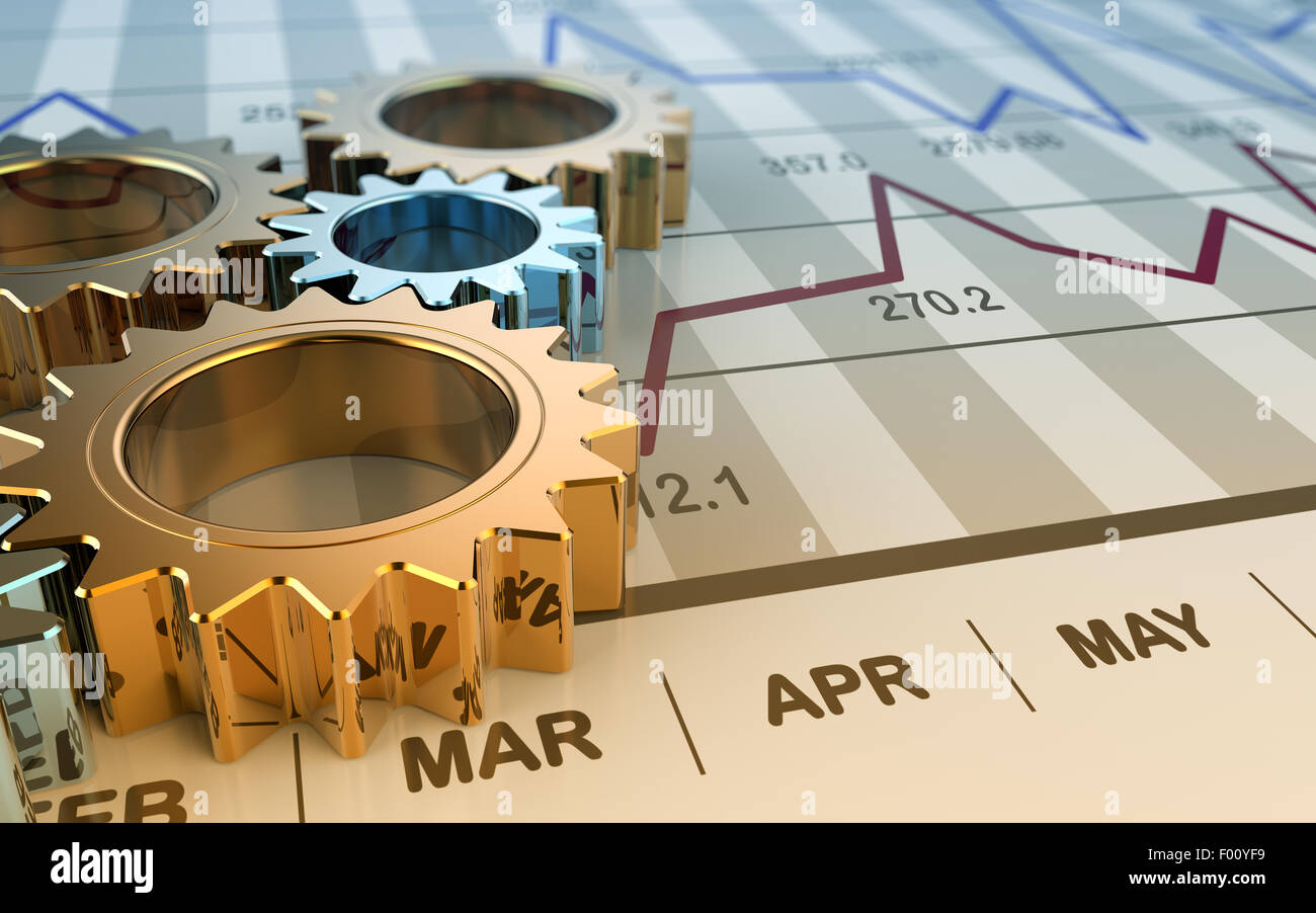 Metal gears on graph paper Stock Photo Alamy