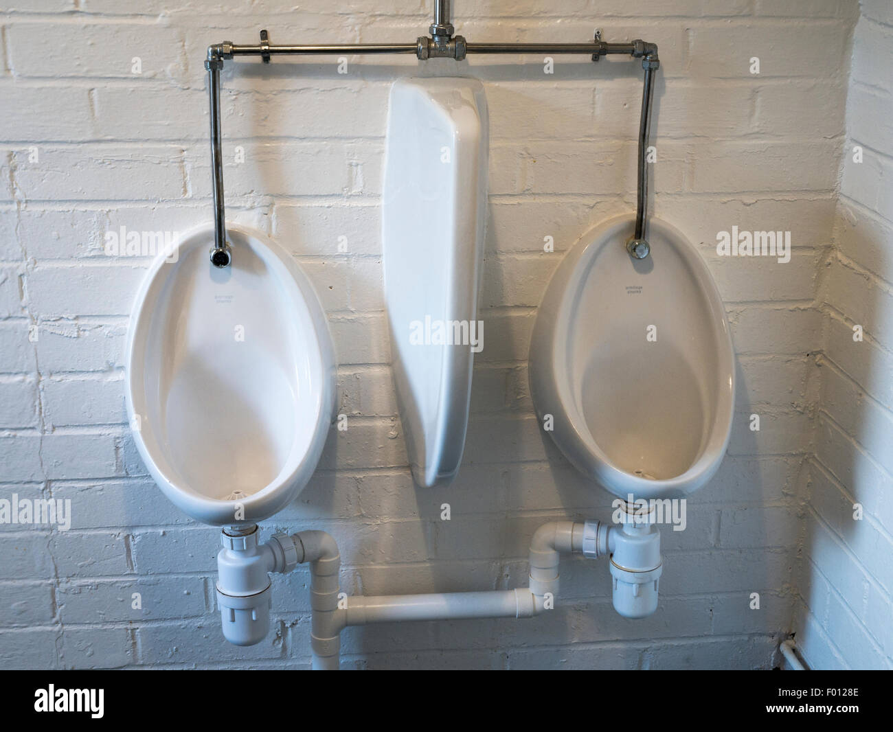 Men's Urinals Stock Photo Alamy